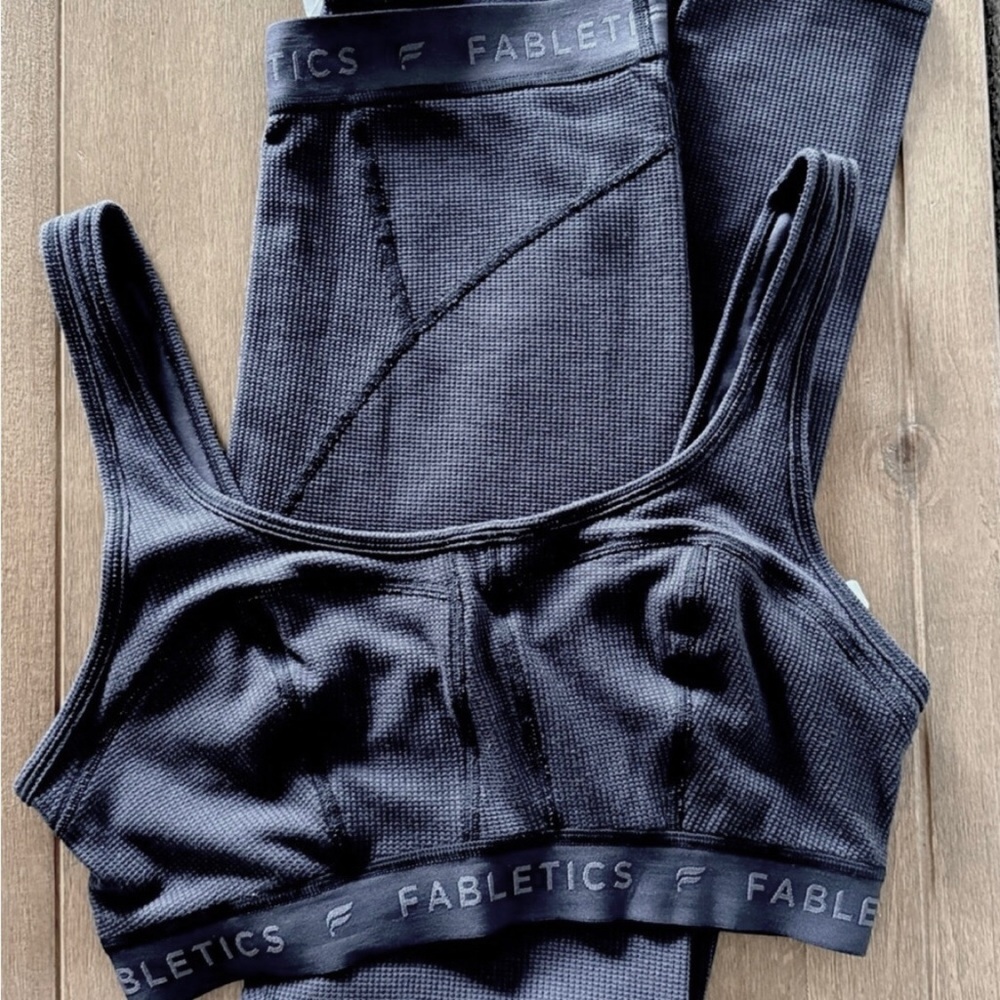 Fabletics, thermal leggings and sports bra size medium worn only a couple times.